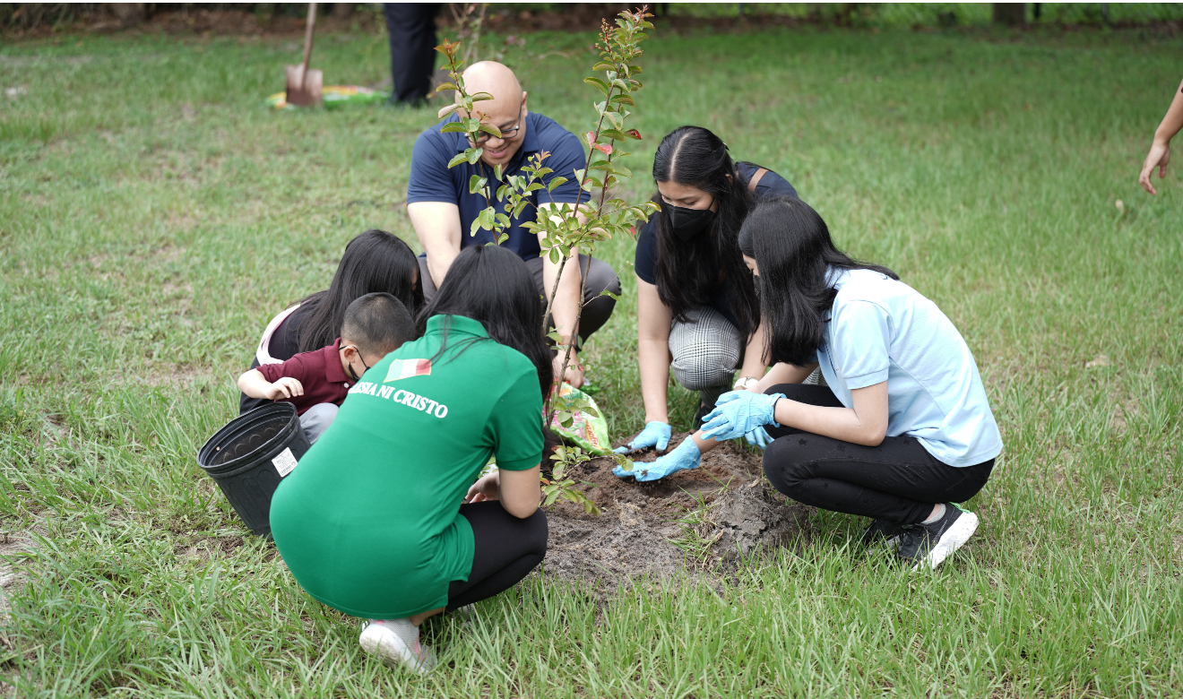 CWS members in Florida plant 108 trees for Church’s 108th anniversary